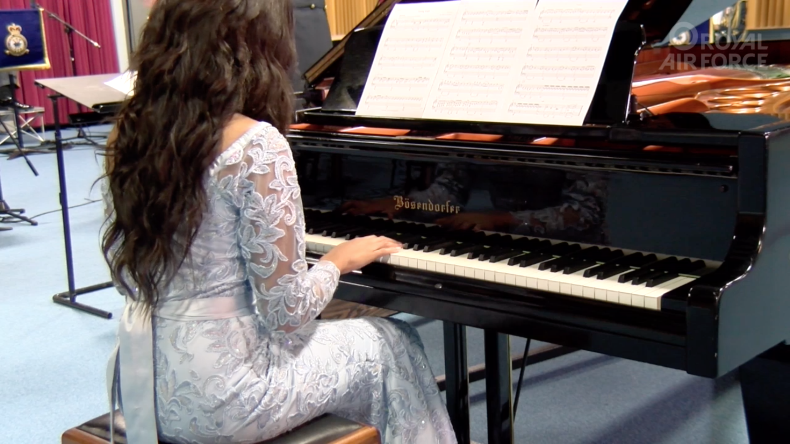 Ify playing the piano.